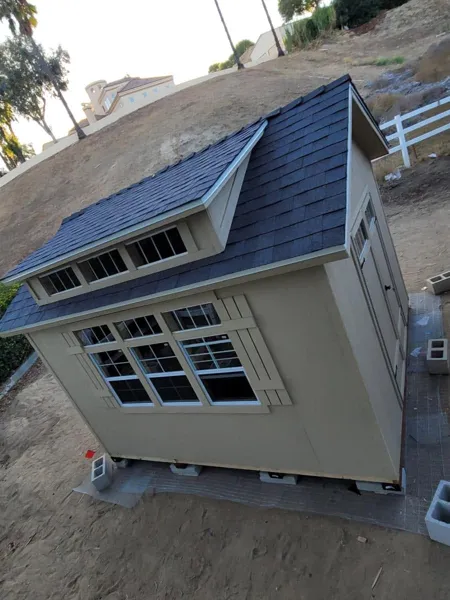 AJM Construction Services: custom shed with dormer windows built in the Inland Empire