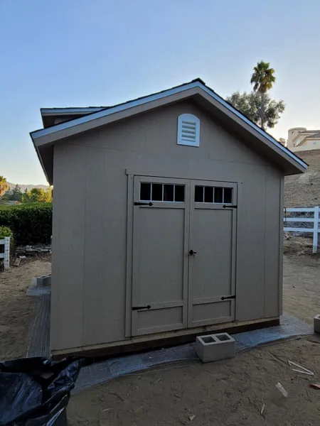 AJM Construction Services: custom storage shed with double doors in Canyon Lake